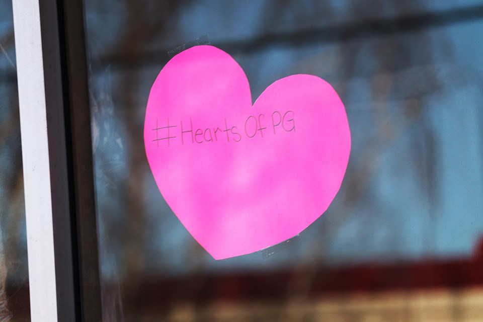 The windows of homes and businesses in Prince George have put hearts in their windows to bring the community together. (via Jess Fedigan)