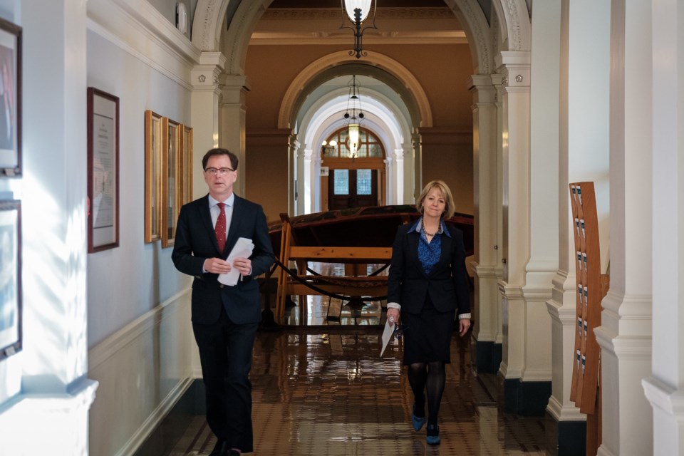 B.C. Minister of Health Adrian Dix (left) and Provincial Health Officer Dr. Bonnie Henry on April 15, 2020. (via Government of B.C. Flickr)