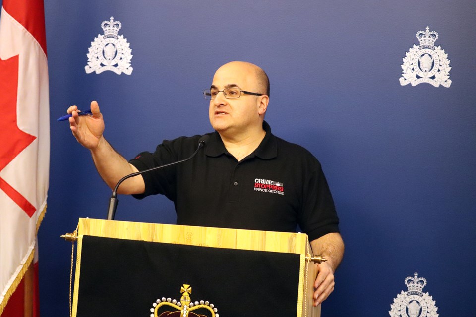 Prince George Crime Stoppers Vice President Ron Polillo hands out the awards for the Prince George Crime Stoppers awards. (via Jessica Fedigan)