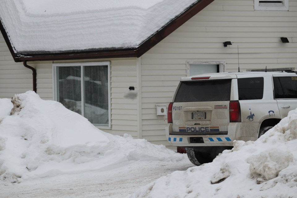 Prince George RCMP walked out of this home while investigating a mentally distressed man with a gun that forced a lockdown on Kelly Road and Heather Park Schools (via Kyle Balzer)