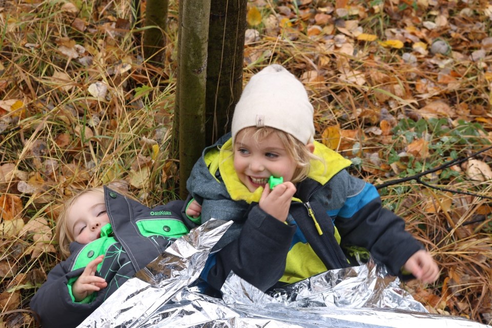 Prince George children literally hugged trees as part of earning 'important' survival skills should they get lost in local forests (via PG Nature Kids)