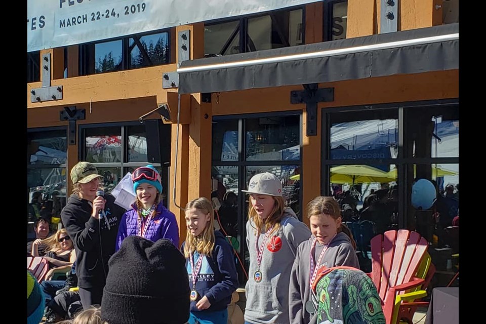 Ella Vonah (middle) with her gold medal and Carla Van Zyl with the silver at the 2019 Kootenay Freestyle Cup (via Facebook/Northern B.C. Freestyle Club)