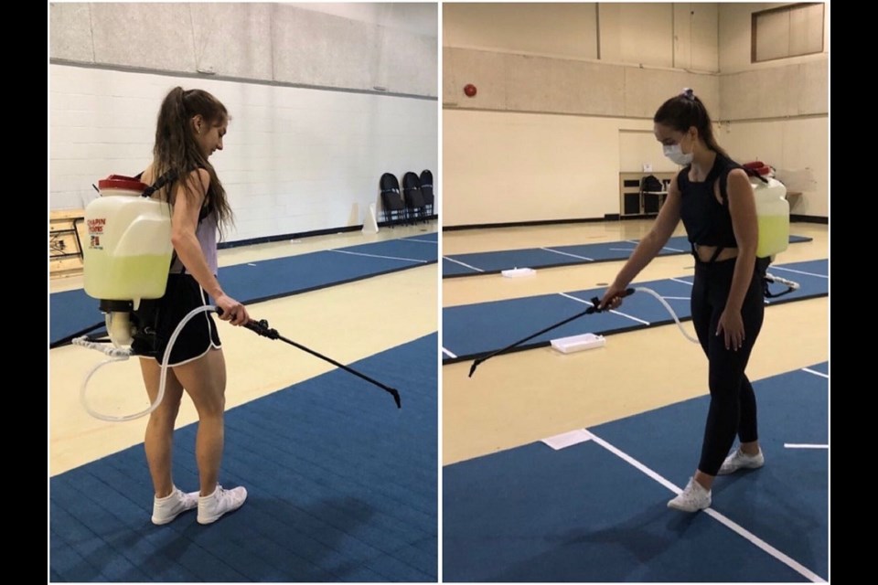 Prince George All-Stars Cheer coaches use spraying backpack to sanitize its mats between practice sessions during COVID-19. (via Submitted/Kyle Balzer, PrinceGeorgeMatters)