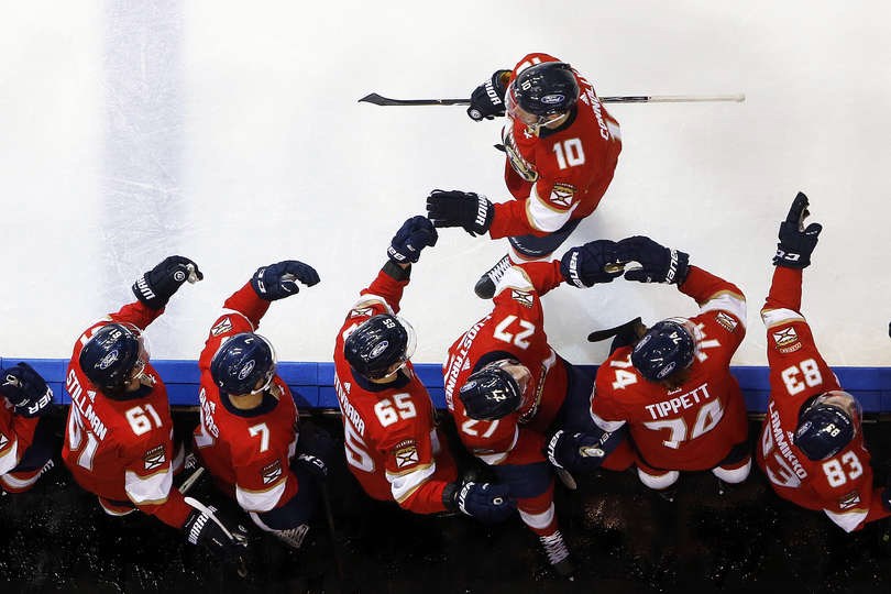 Prince George's Brett Connolly leads the celebration line with his Florida Panther teammates after scoring his 100th career NHL goal.