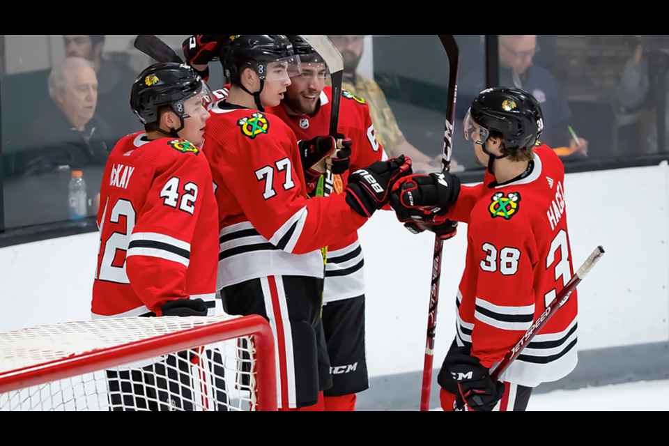 Cole Moberg (#62) of the Prince George Cougars celebrates a goal he assisted on for the Chicago Blackhawks during the 2019 Traverse City Tournament. / Chicago Blackhawks