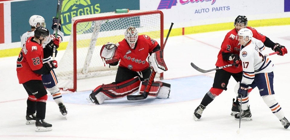 Taylor Gauthier (#35) gets ready to make a save for the Prince George Cougars against Kamloops on home ice (via Chuck Chin Photography)