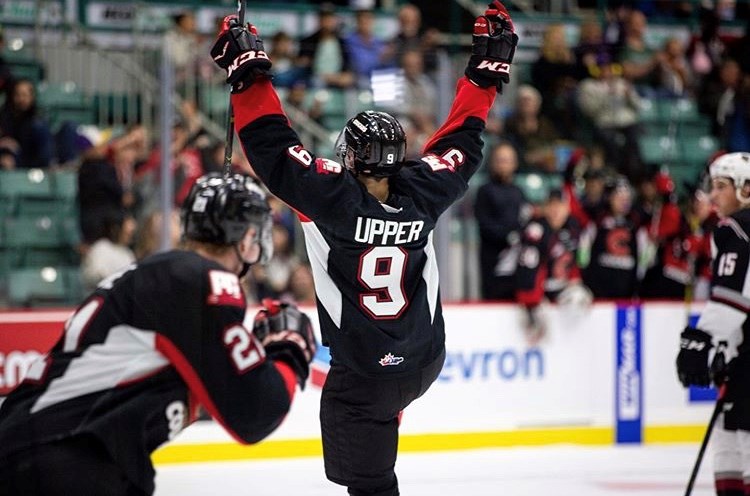 Tyson Upper (#9) celebrates a goal against the Vancouver Giants at the CN Centre (via Prince George Cougars/Brett Cullen Photography)