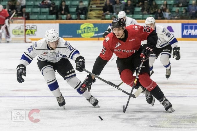 Mike MacLean (#23) skates up ice with the puck at the CN Centre against the Victoria Royals (via Prince George Cougars/James Doyle Photography)