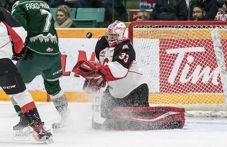 Isaiah DiLaura (#33) makes a save at the CN Centre against the Everett Silvertips (via Prince George Cougars/James Doyle Photography)