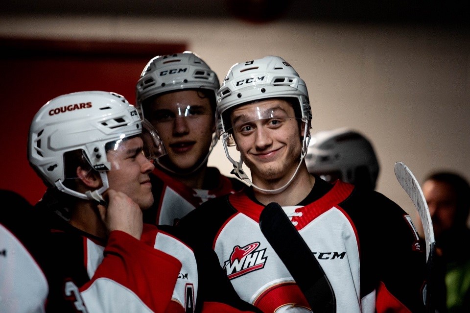 Tyson Upper (#9) smiles for the camera in the players' tunnel before a home game against Everett (via Prince George Cougars/Brett Cullen Photography)