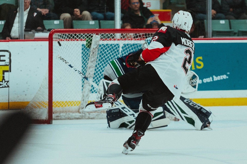 Prince George Cougars defenceman Cole Moberg pots the shootout winner against the Seattle Thunderbirds at the CN Centre (via Brett Cullen Photography)