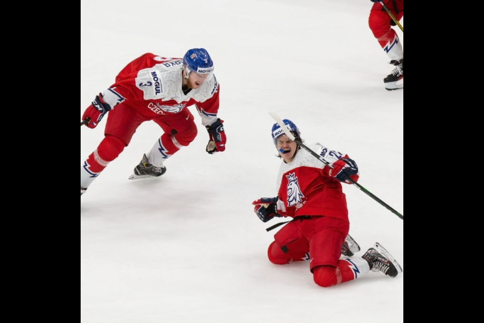 Prince George Cougars forward Filip Koffer (right) celebrates after scoring the eventual game-winning goal for the Czech Republic in a 2-0 win over Russia at the 2021 World Junior Hockey Championships in Edmonton.