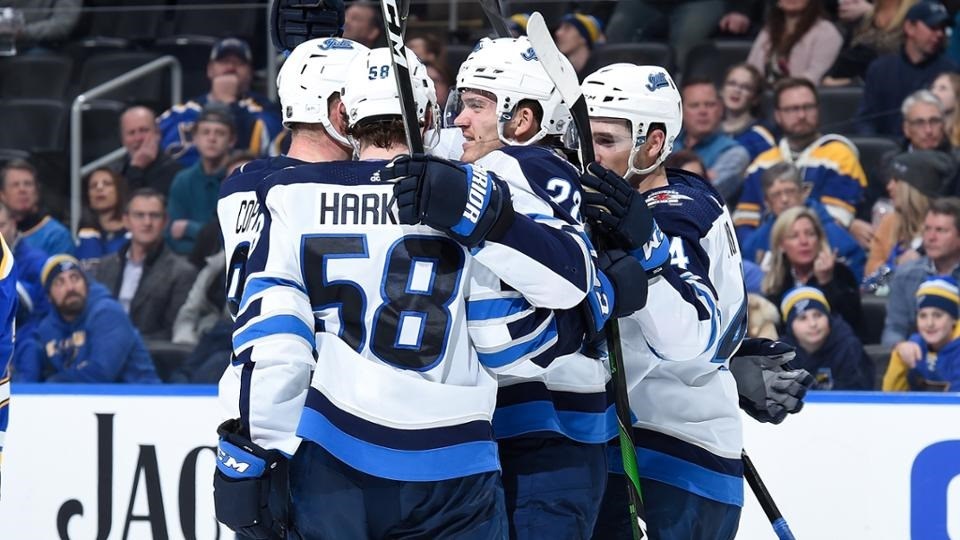 Jansen Harkins (#58) celebrates with his Winnipeg Jets teammates after scoring his first career NHL goal (via Winnipeg Jets)