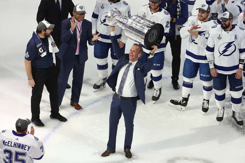 Prince George's Jon Cooper hoists the Stanley Cup high above his head after winning the 2020 playoffs with the Tampa Bay Lightning. | NHL/Getty Images