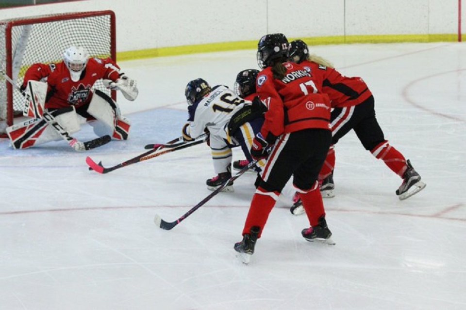 Northern Capitals in action against the Fraser Valley Rush in B.c. Female Midget AAA hockey (via Fraser Valley Rush)