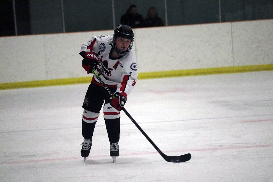 Northern Capitals defenceman Kiera Mulder (#5) passes the puck up ice during the 2019-20 home-opener (via Kyle Balzer)