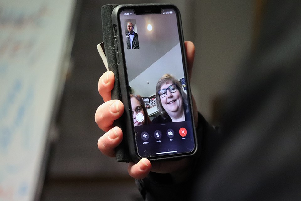 Chad Staley's mother Jennifer video-called from the United States to watch the new Prince George arena's sign be unveiled on March 9, 2021.