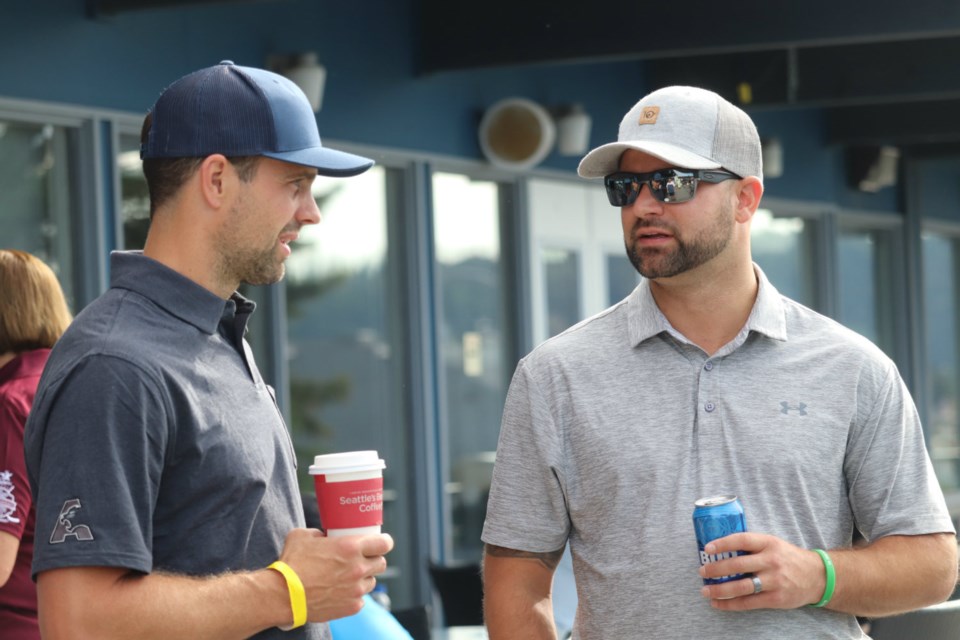 Dan Hamhuis (left), current NHL defenceman, part-owner and alumni of the Prince George Cougars, attended the team's 2019 charity golf tournament (via Kyle Balzer)