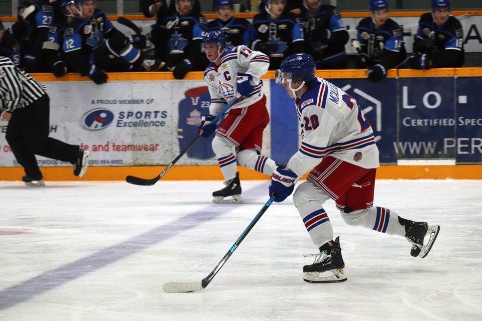 Ryan McAllister (#20) carries the puck up ice for the Prince George Spruce Kings (via Kyle Balzer)