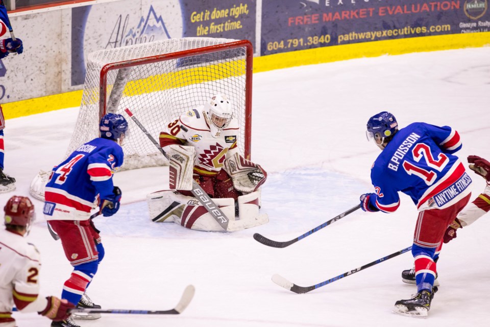 The Poisson brothers, Ben (#12) and Nick (#24), team up for a scoring opportunity for the Prince George Spruce Kings during a 2019 playoff game (via Damon James Photography)