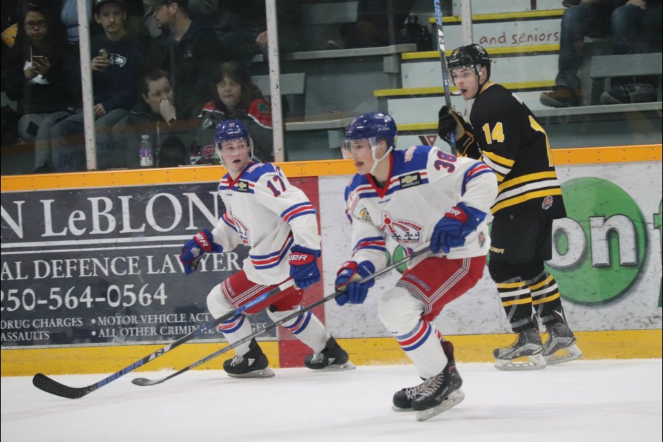 Lucas Vanroboys (#38) of the Prince George Spruce Kings sees the play from the boards during a 2019 playoff game against the Coquitlam Express (via Kyle Balzer)