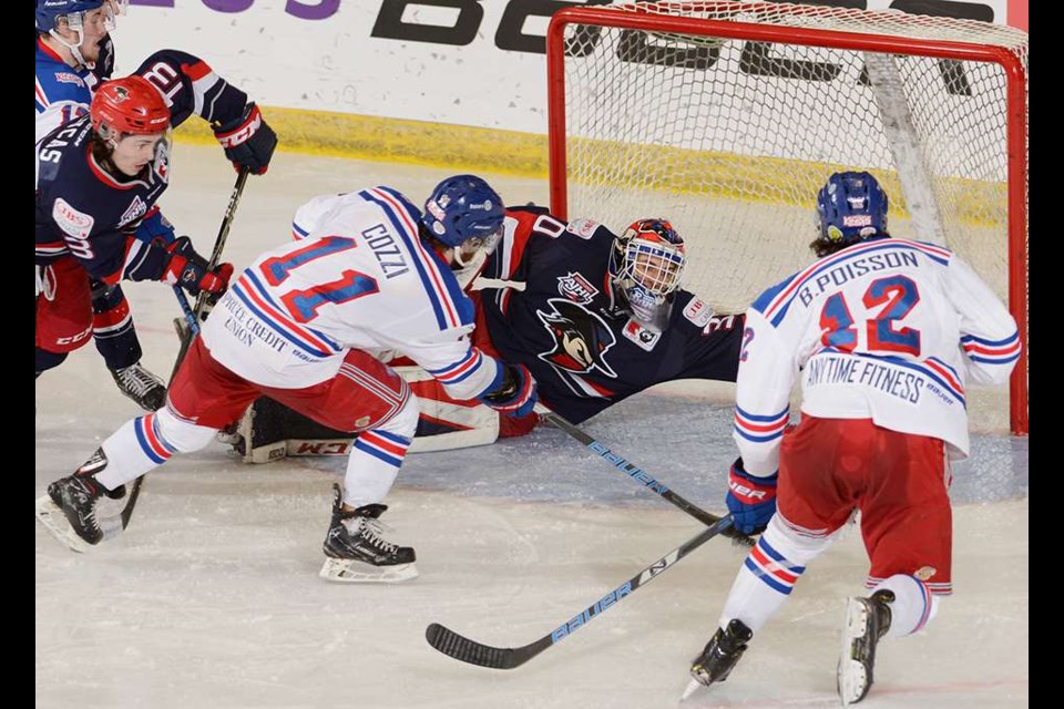 Patrick Cozzi (#11) puts the puck in the Brooks Bandits' net for the Prince George Spruce Kings in the 2019 National Championship final (via Hockey Canada/Matthew Murnaghan)