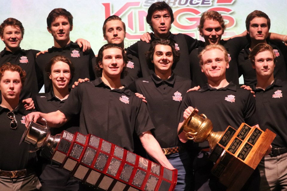 Prince George Spruce Kings smiling greatly for what was one of their last 2018-19 team photos with the Fred Page and Doyle Cups (via Kyle Balzer)