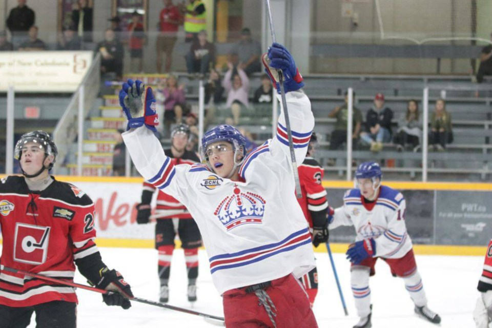 Brett Pfoh (#9) lifts his hands in celebration after scoring a goal for the Prince George Spruce Kings (via Chuck Chin Photography)