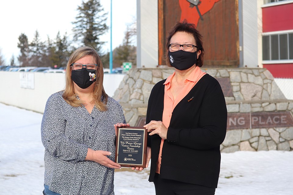 Kim Rud, PGNFC's Director of Early Childcare Services and Barb Ward-Burkitt, PGNFC Executive Director pose with award. 