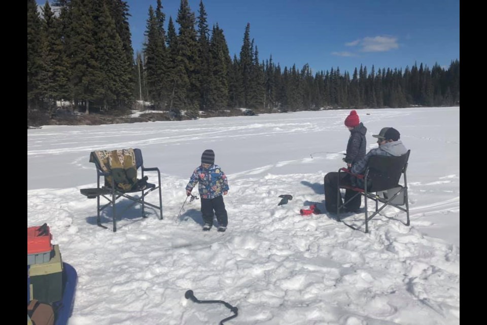 Even the kids like to ice-fish in April. (via Justina Belsham)