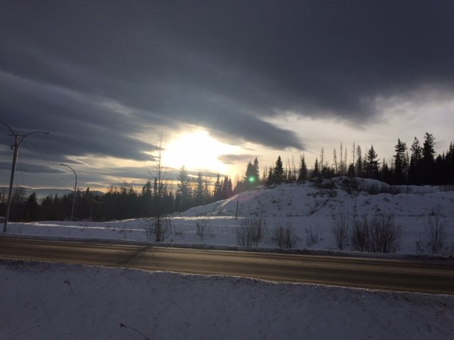 Rosmarie Vonah - Jan. 8, 2021 sun clouds winter dark