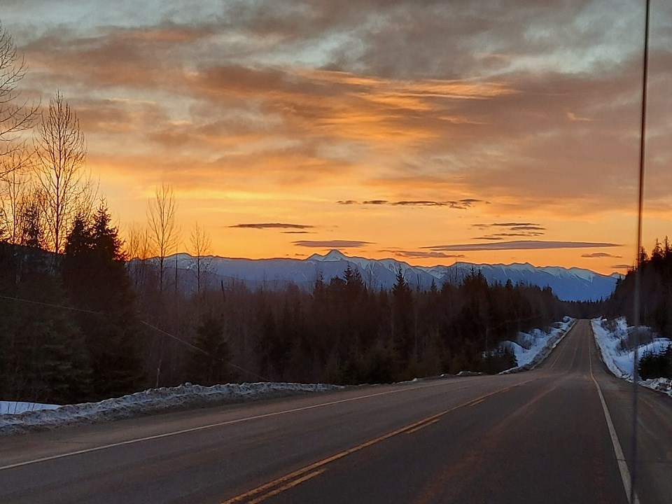 Shane Perry - March 18, 2021 Kenneth Creek Highway 16 sunrise orange sky winter