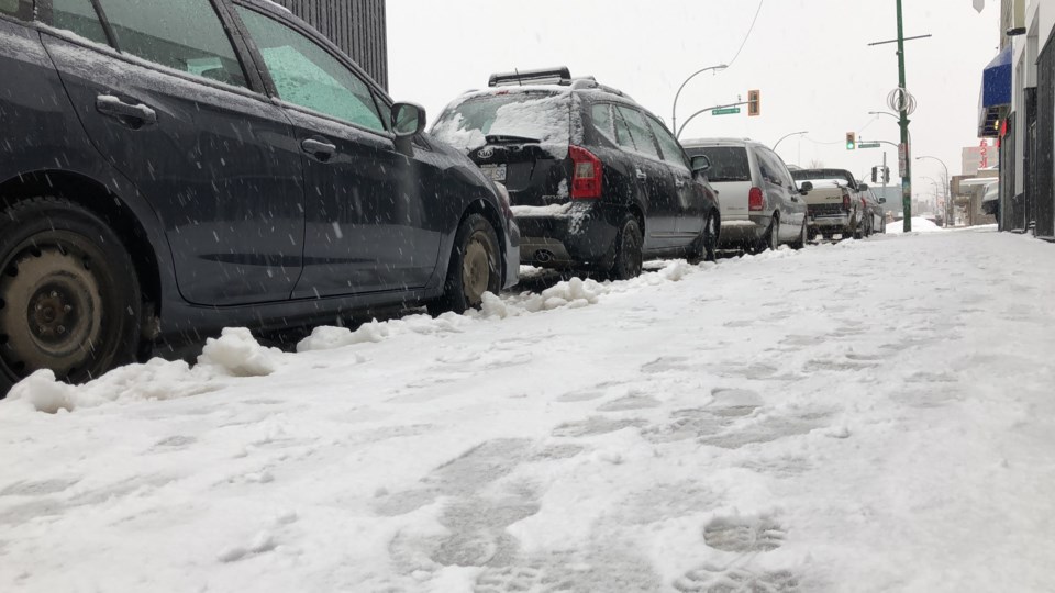 Snow on ground with cars