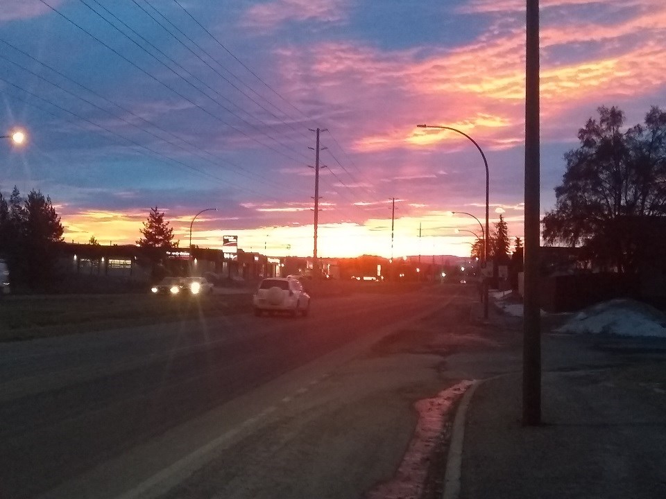 Terry Miller - March 8, 2021 winter sunrise over Ospika Boulevard orange pink yellow blue