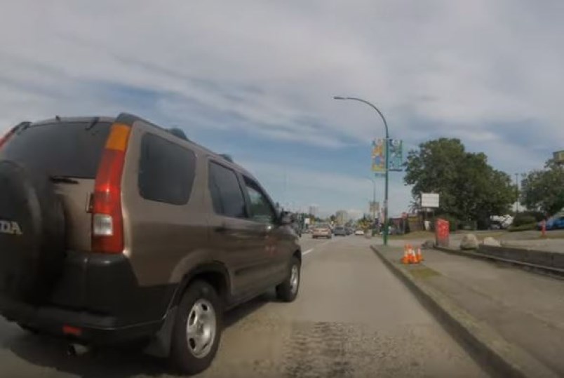 Car in bicycle lane