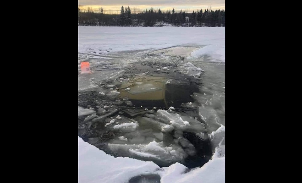 Facebook pick-up truck submerged in Charlie Lake