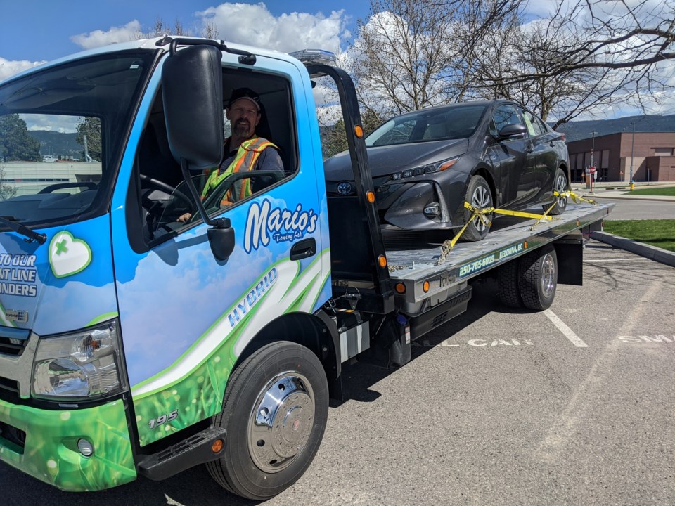 Mario's Towing hybrid truck