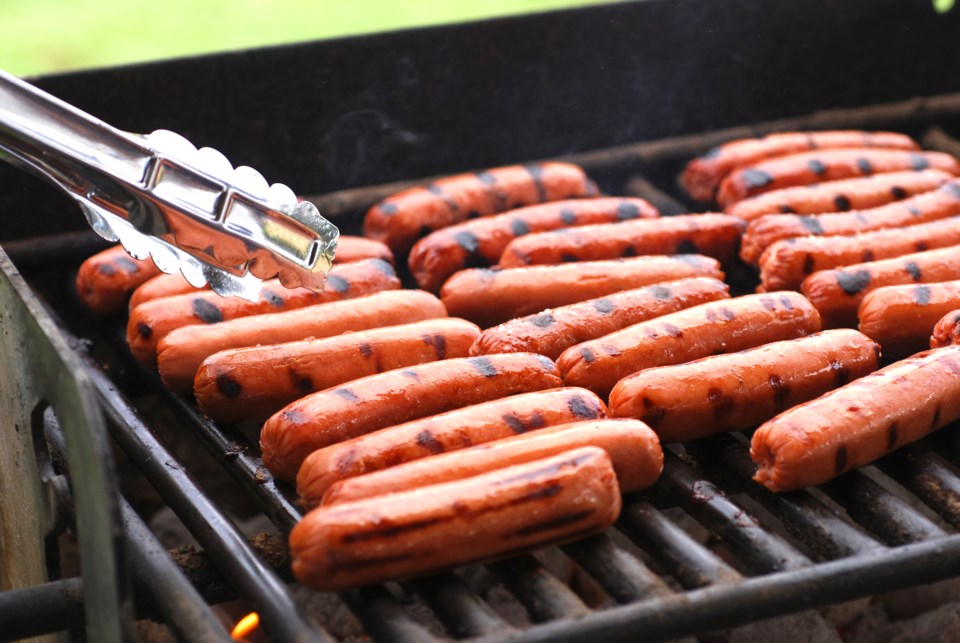 Hot dogs on barbecue