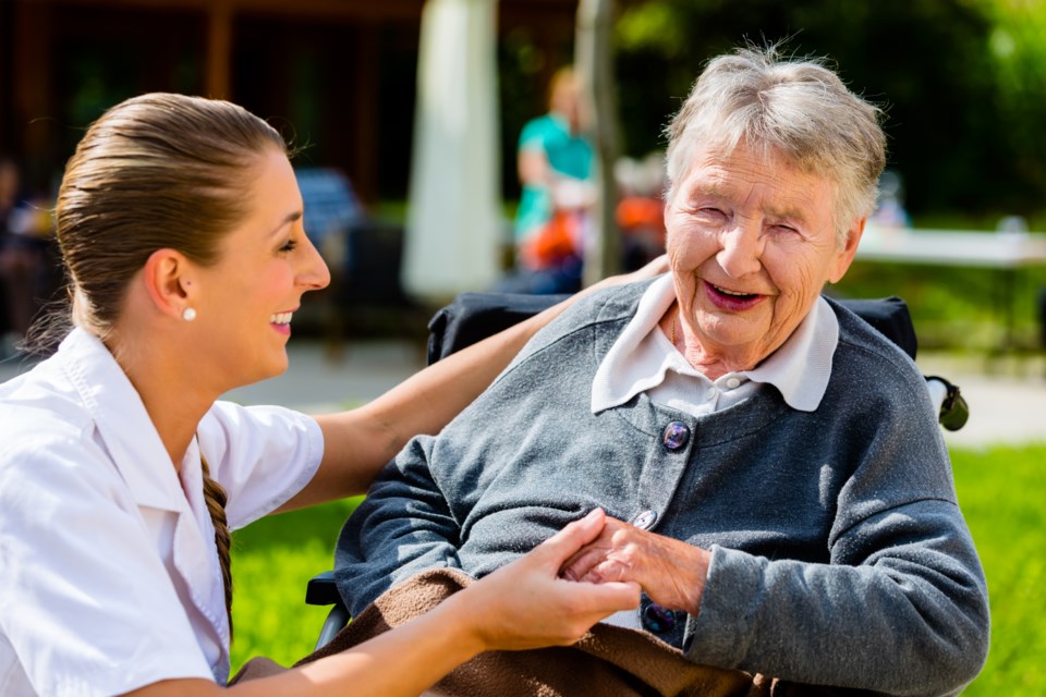 Old person and carer