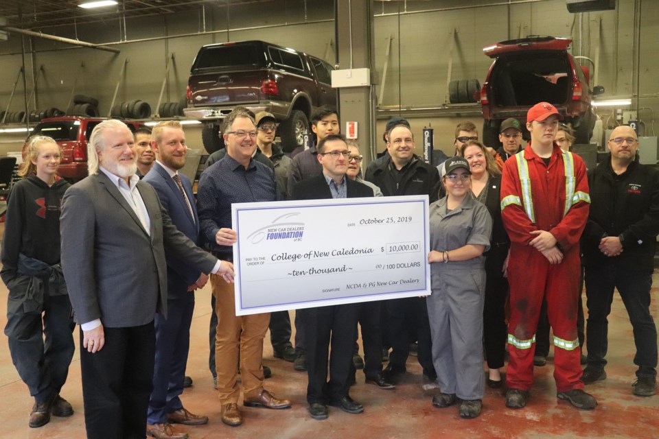 The College of New Caledonia's Auto Service Technician Foundation-level program receives $10,000 cheque for future students, one of three total grants for scholarships and bursaries (via Kyle Balzer)