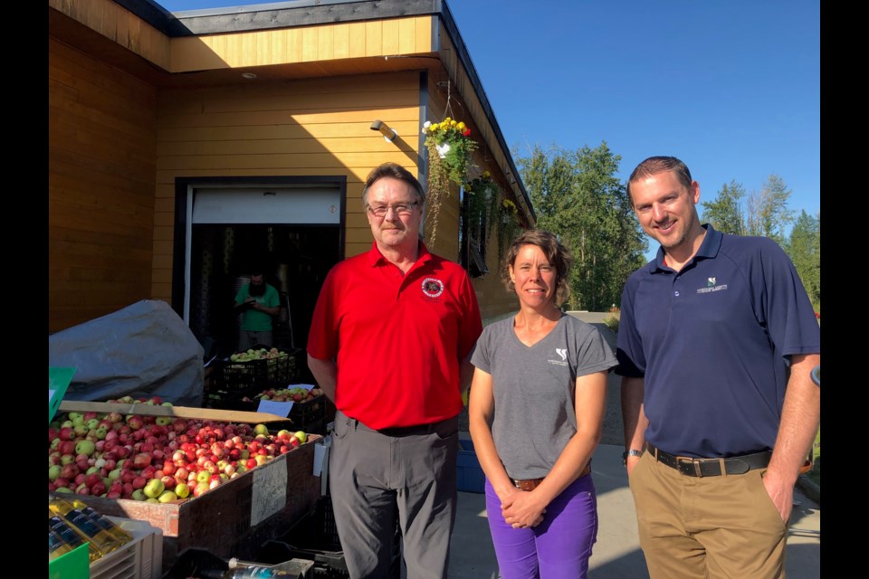 Northern Bear Awareness' Dave Bakker and Northern Lights Estate Winery's Doug Bell and Noemie Touchette announce the fifth year of partnership between the two groups. (via Hanna Petersen)