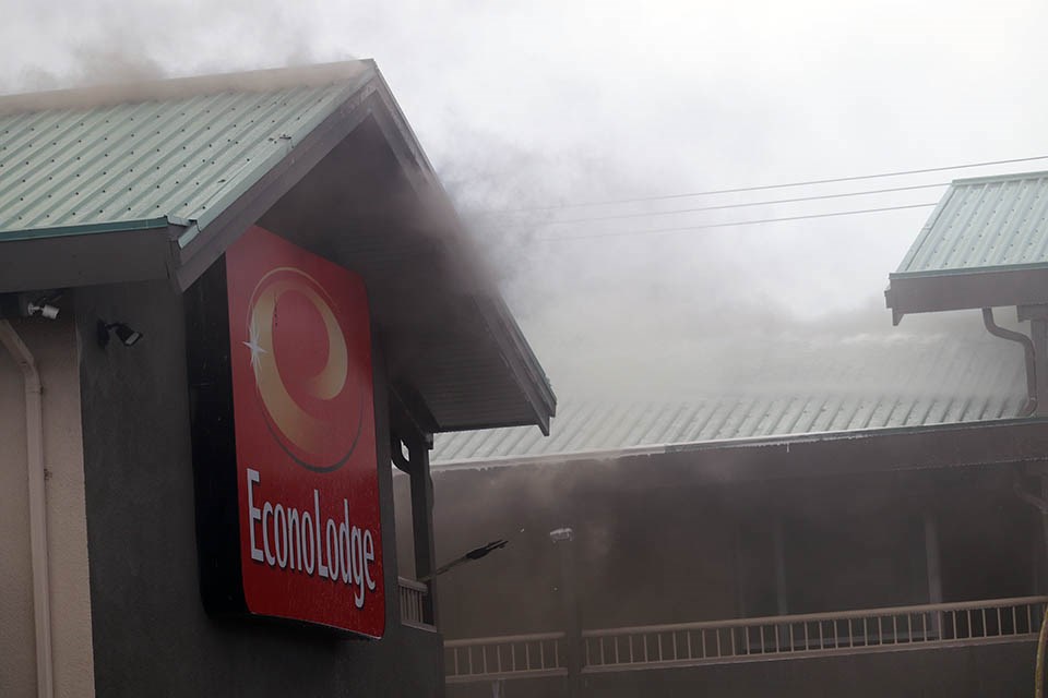 Prince George Fire Rescue crews battle a blaze engulfing the Econo Lodge near 15th Avenue and Victoria Street on July 8, 2020. (via Kyle Balzer, PrinceGeorgeMatters)