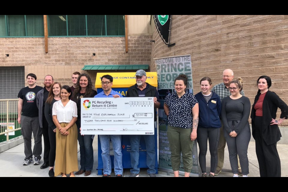 Exploration Place accepts $3,500 donation from Prince George Recycling, which helped keep the Terry Fox exhibit in its facility for one more month (via Kyle Balzer)