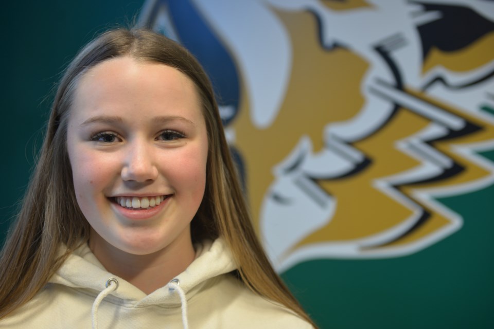 Isabel Fuller of Prince George is all smiles in signing with her hometown UNBC Timberwolves, joining the women's basketball team for 2019-20 (via UNBC Athletics)