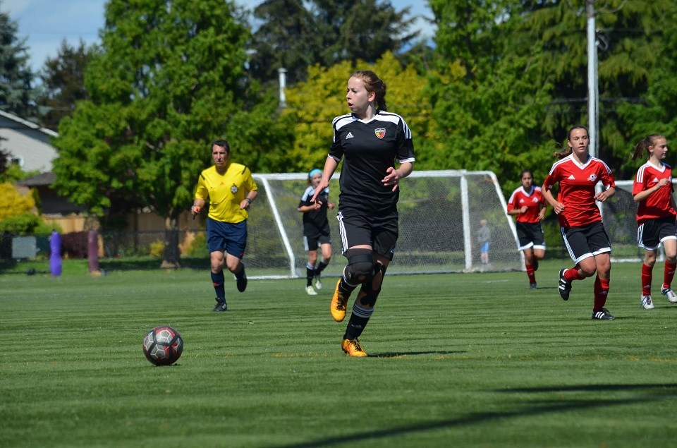 Madison Taylor looks for her teammates while controlling the ball during BC Premier League play. She's the latest 2020-21 recruit for the UNBC women's soccer team. (via Submitted)