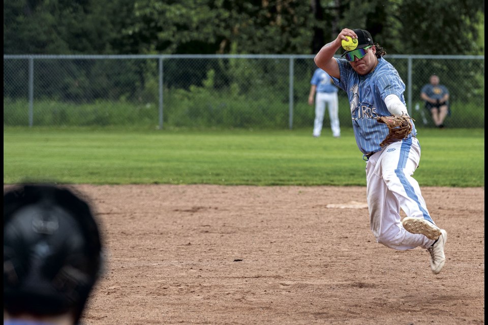 Nak'azdli Hummingbirds pitcher #22  Brydon Lessard goes through his windup and delivery during their battle against Big Guy Lake Saturday.