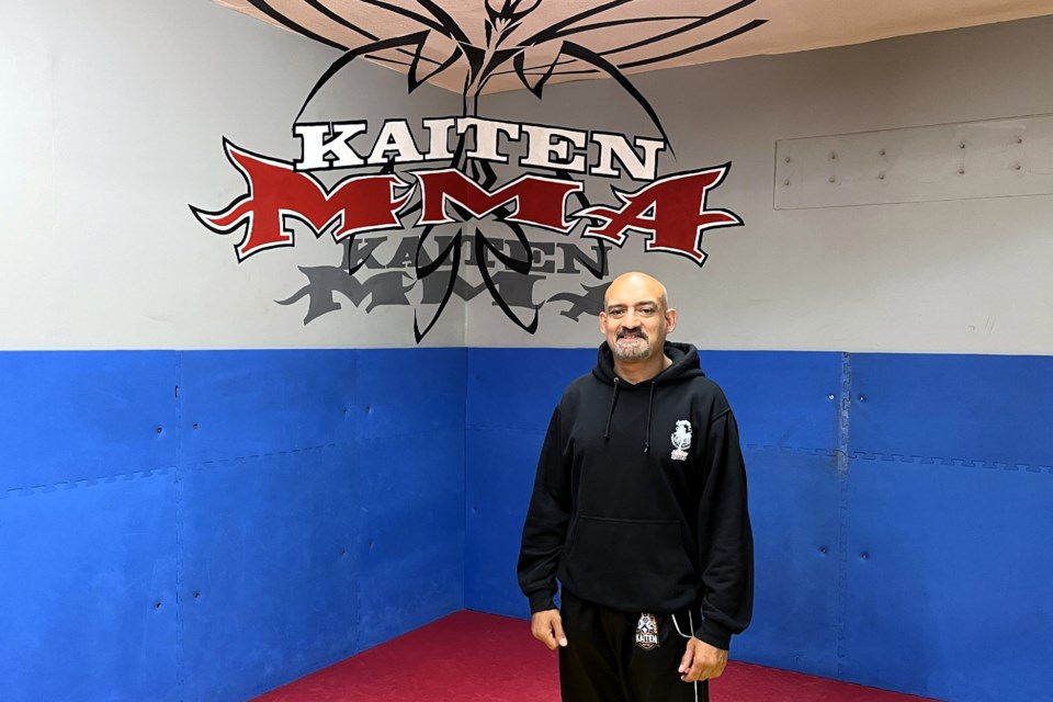 Kaiten Mixed Martial Arts Academy owner and Standing Committee on Public Safety member Karm Manhas stands in his gym on Friday, July 11, 2025.