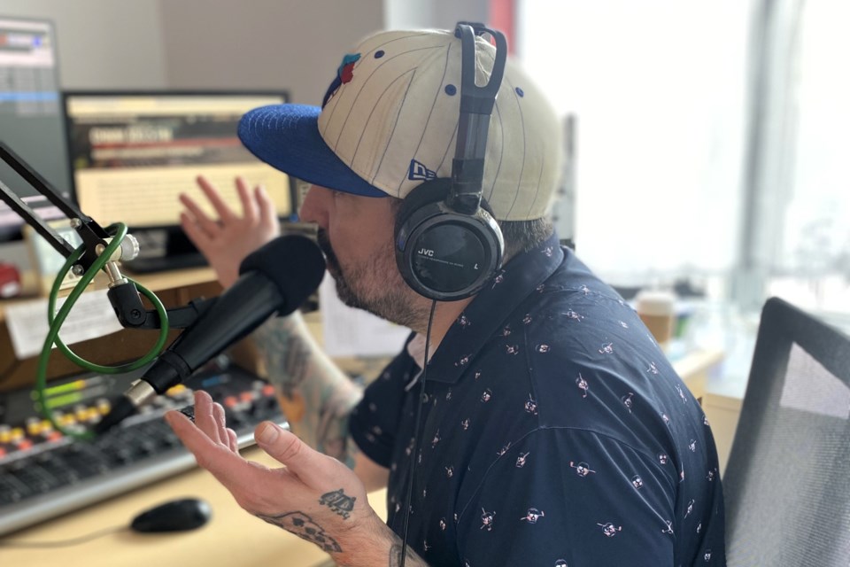 CHMM 103.5 FM station manager Paul Smith hosts his morning station out of a studio at Mackenzie Mall. The non-profit radio station moved to the location in June 2024.