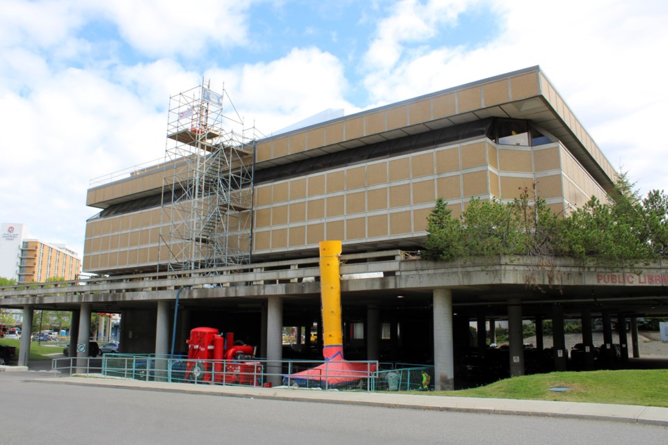 Scaffolding is seen on the exterior of the Prince George Public Library's Bob Harkins Branch on Wednesday, Aug. 13, 2025. Crews are working on roof repairs.