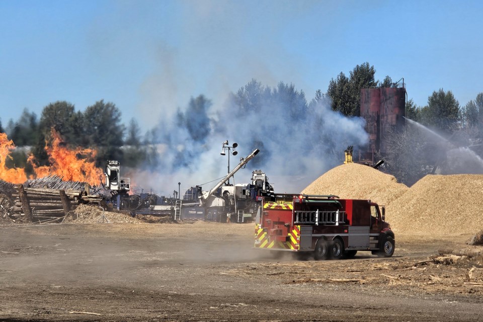 Firefighters tackle a fire near Pinecrest Road in Quesnel on Saturday, Aug. 23, 2025